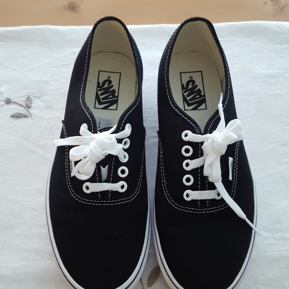 Black classic Vans. Women's  9 and men's 7 1/2